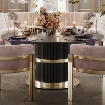Round Modern Ribbed Veneer Dining Set A luxurious dining area featuring the Round Modern Ribbed Veneer Dining Set, adorned with purple napkins, elegant tableware, and embellished with candles and a floral centerpiece. The setup includes plush light pink chairs, creating an opulent and sophisticated atmosphere.