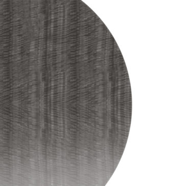 Round Modern Ribbed Veneer Dining Set Close-up of the Round Modern Ribbed Veneer Dining Set, showcasing its distinct, ribbed, wavy pattern covering the surface. The dining set extends from the left side of the image and fades into a white background on the right.