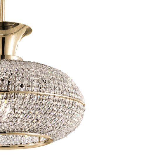 Contemporary Crystal Pendant Light A close-up view of the Contemporary Crystal Pendant Light reveals its elegant and contemporary design. Featuring a gold-finished, dome-shaped shade, it showcases an intricate crystal pattern that reflects light to create a sparkling effect. Suspended from a polished gold stem, this fixture exudes luxurious and timeless style.