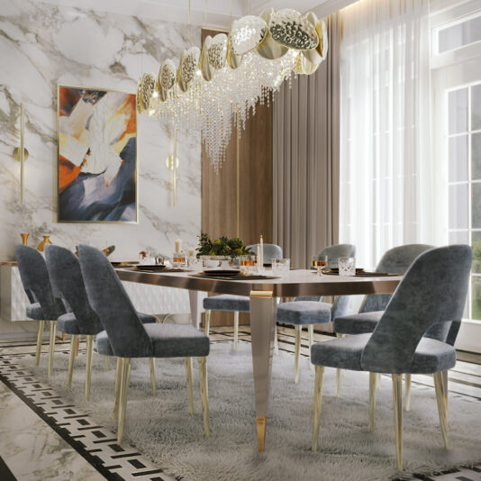 Modern High Backed Dining Chair A modern dining room with a marble tabletop and Modern High Backed Dining Chairs upholstered in blue around it. A large, elegant chandelier with crystal accents hangs above the table. The room features marble walls, a large abstract painting, and sheer curtains allowing natural light through the windows.