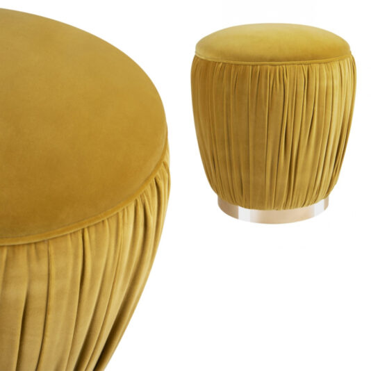 The Ruched Pouffe With Gold Plated Base features a yellow velvet ottoman with a pleated, ruched design and a round shape. Its base showcases a shiny, gold-plated metallic finish. The ottoman has a plush, cushioned top and is presented in two perspectives: a close-up of the side and a full view from the front.