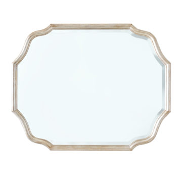 Curved Italian Wall Mirror The Curved Italian Wall Mirror showcases a rectangular shape with elegantly curved edges encased in a light wooden frame. Its simple yet stylish design makes it a versatile addition to various decor themes while providing a clear, undistorted reflection.