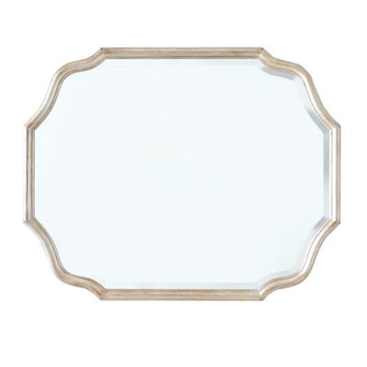 The Curved Italian Wall Mirror showcases a rectangular shape with elegantly curved edges encased in a light wooden frame. Its simple yet stylish design makes it a versatile addition to various decor themes while providing a clear, undistorted reflection.