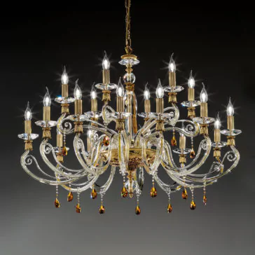 Candelabra Style Chandelier With Swarovski Crystals The Candelabra Style Chandelier With Swarovski Crystals, featuring an elegant design of intricate gold and crystal details, hangs from the ceiling. It boasts numerous candle-like lights arranged in multiple tiers and is adorned with amber-colored Swarovski crystals, casting a bright and sophisticated illumination.