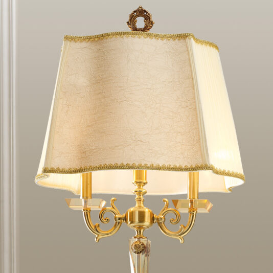 Luxury Classical Floor Lamp Introducing the Luxury Classical Floor Lamp, a sophisticated lighting fixture featuring a stunning golden finish and three gracefully curved arms. Topped with an elegantly patterned beige lampshade and an intricately detailed knob, this luxurious piece exudes vintage charm, making it the perfect centerpiece for any opulent interior setting.