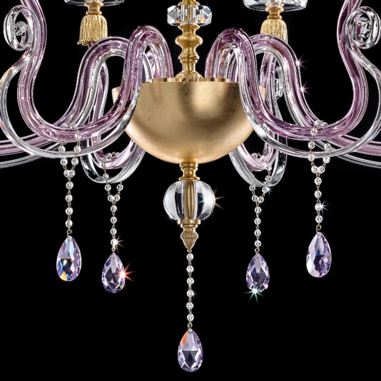 A close-up of the Contemporary Candle Style Glass Chandelier, showcasing its elegant and modern design with gold, purple, and clear elements. The chandelier features candle-style curved glass arms, a central gold bowl, and hanging crystal pendants. Photographed against a black background, the image highlights the chandelier's luxurious details.