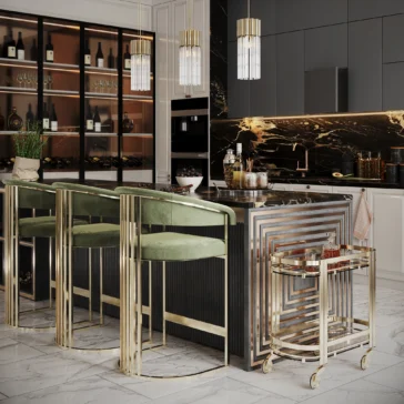A luxurious kitchen features a marble island with gold accents and contemporary green velvet bar stools. Nearby, a Contemporary Curved Drinks Trolley adds elegance, while shelving with wine bottles sits beneath graceful pendant lights. Marble flooring enhances the opulent decor.