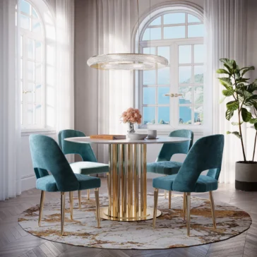 The dining room features a Modern Round Marble Dining Set with a golden base, paired with four teal velvet chairs. A circular chandelier hangs above, while large windows offer an ocean view. Decor includes a plant and a vase of flowers.
