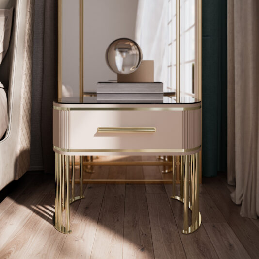 Art Deco Style Ribbed Bedside Table An Art Deco Style Ribbed Bedside Table, featuring a modern and elegant design with gold accents, a single drawer, and decorative legs, is placed next to the bed. It holds stacked books and a round mirror. Natural sunlight streams in through nearby windows, casting shadows on the wooden floor.