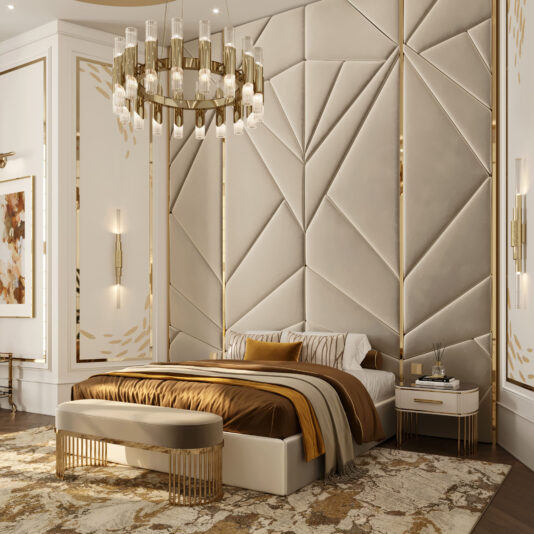 A luxurious bedroom showcases a grand upholstered headboard in beige, adorned with geometric patterns. A modern chandelier elegantly illuminates the space above a low bed accented with gold and brown details. The room is tastefully decorated with gold-framed wall art and features a plush rug. An elegant nightstand paired with wall sconces enhances the sophisticated ambiance, while a stylish Contemporary Art Deco Style Bench completes the look.