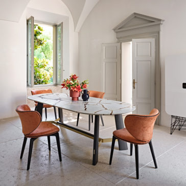 Contemporary Oval Quartz Dining Set A contemporary dining room showcases the