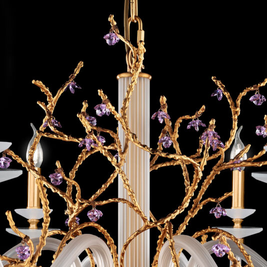 The Candle Style Chandelier With Swarovski Crystal Flowers features intricate gold design with twisting branches and small Swarovski crystal flowers set against a black background. This luxurious and elegant piece includes candle-like light fixtures adorned with white accents.