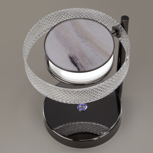 Introducing the Contemporary Round Table Lamp With Marble Effect, featuring a cylindrical base adorned with a circular, crystal-like textured ring and complemented by a marble-patterned shade. This sleek lamp boasts a glossy finish and an integrated blue power button on the base, combining style and elegance seamlessly.