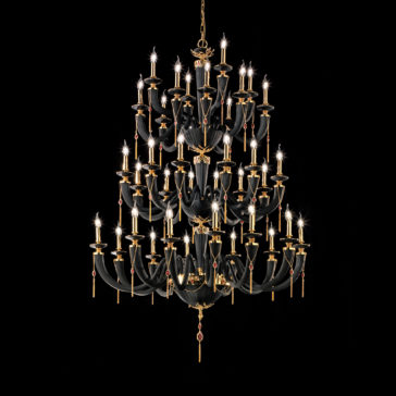 Large Classic Black Chandelier With Swarovski® Crystals Against a black background hangs the Large Classic Black Chandelier With Swarovski® Crystals, an ornate, multi-tiered masterpiece. This sumptuous fixture boasts numerous candle-like lights arranged in circular patterns and is adorned with gleaming Swarovski® crystals and golden accents, exuding a luxurious and classical aesthetic.