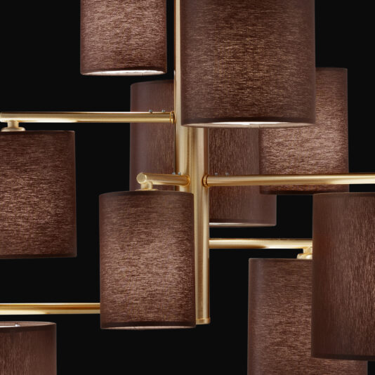 The Large Modern Chandelier With Shades boasts cylindrical brown fabric lampshades and gold metal arms, beautifully set against a black background. Its intricate design features multiple shades branching out from a central gold structure, exuding elegance and sophistication.