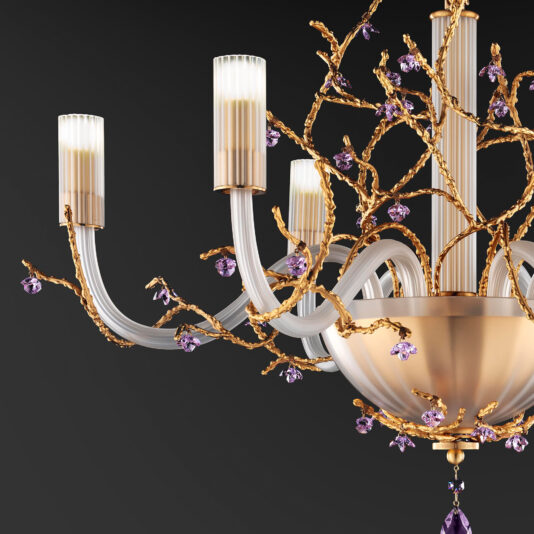 A close-up photo of the **Modern Chandelier With Swarovski Crystal Flowers** showcases its elegant, modern design. The chandelier features gold branches adorned with small purple Swarovski crystal flowers, and multiple candle-like lights with frosted glass covers extend from a central golden base. The background is a dark gray.