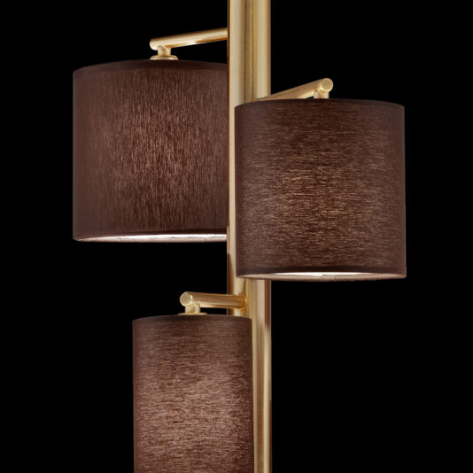 Modern Floor Lamp With Shades A detailed view of the Modern Floor Lamp With Shades highlights three cylindrical brown fabric lampshades and a sleek gold metal frame against a black background. The design boasts adjustable shades connected to a central vertical rod, delivering a contemporary and elegant aesthetic.