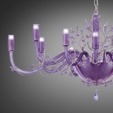 Modern Purple Glass Chandelier With Swarovski Crystal Flowers The Modern Purple Glass Chandelier With Swarovski Crystal Flowers boasts a purple theme, featuring multiple curved arms and candle-like light fixtures. Adorned with intricate details and small Swarovski crystal flowers, it creates an elegant and sophisticated appearance against a gradient gray background.