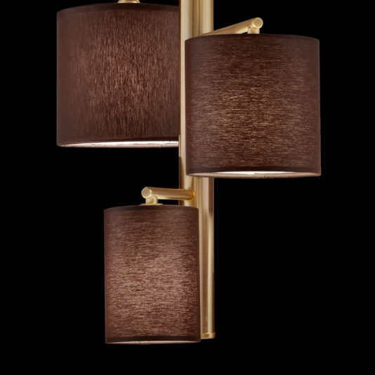 A close-up of the Modern Triple Pendant Light With Shades, featuring an elegant gold wall-mounted design with three vertically arranged, brown cylindrical lampshades. The lampshades boast a textured surface, adding a stylish and modern touch to the overall design. The black background accentuates the fixture beautifully.