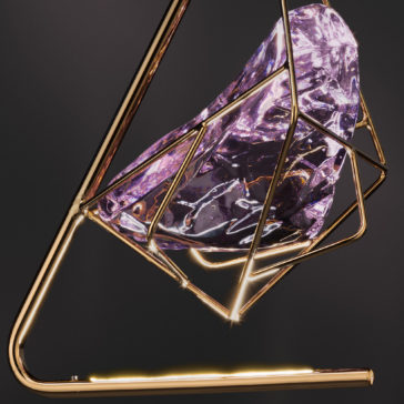 The Rose Crystal Rock Pendant Light features a sleek, artistic design with an intricately geometric gold frame that houses a large, translucent purple crystal. Its polished rose crystal emits a gentle, glowing radiance against any dark background.