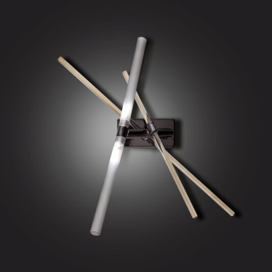 The Contemporary Murano Glass Tube Wall Light is a modern wall sconce that features three intersecting tubular light fixtures in a sleek, minimalist design. These fixtures are mounted on a rectangular black base and emit a soft, ambient glow against a dark background, creating an elegant and sophisticated look.