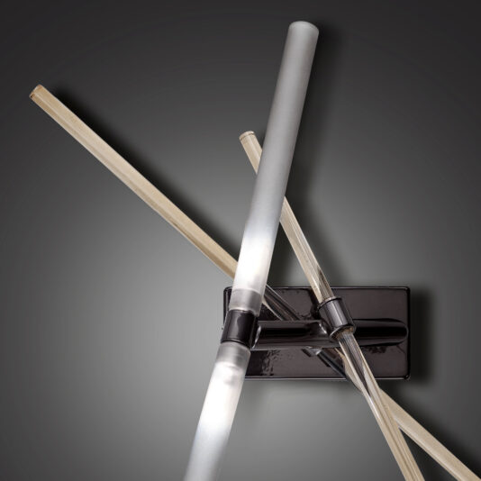 Contemporary Murano Glass Tube Wall Light The Contemporary Murano Glass Tube Wall Light showcases three LED tubes in various orientations, all connected to a sleek, rectangular black base. The design is reminiscent of Murano glass and is complemented by a gradient gray backdrop that enhances its minimalist aesthetic.