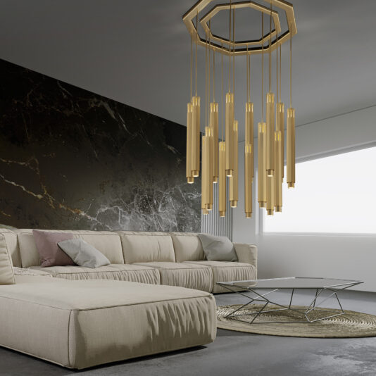 Large Modern Geometric Pendant Style Chandelier A modern living room featuring a large beige sectional sofa with assorted cushions, a sleek rectangular glass coffee table with a geometric metal base, and a striking Large Modern Geometric Pendant Style Chandelier hanging from the ceiling. The back wall is dark with a marble-like pattern.