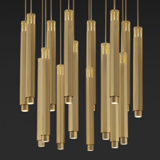 Large Modern Geometric Pendant Style Chandelier The Large Modern Geometric Pendant Style Chandelier features multiple elongated cylindrical gold pendants hanging at varying lengths, each housing a small light at the bottom. Set against a dark background, the design highlights the warm glow emitted by the lights.