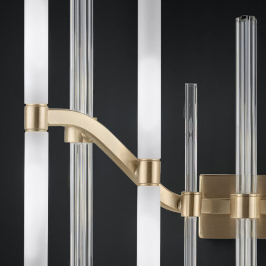 Large Vertical Murano Glass Tube Wall Light Presenting the Large Vertical Murano Glass Tube Wall Light, this modern wall-mounted fixture boasts a gold-colored frame and stunning vertical Murano glass tubes in both frosted and clear finishes, all set against a dark background for a striking visual effect.