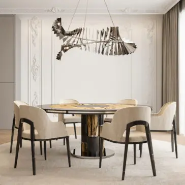 Luxury Round Ebony Veneer Dining Table Set A modern dining room features the Luxury Round Ebony Veneer Dining Table Set, complete with a glossy, patterned top and six upholstered chairs sporting dark wooden legs. The space highlights ornate white wall moldings and is illuminated by a unique, sculptural chandelier. Large windows adorned with sheer curtains allow ample natural light to flood in.