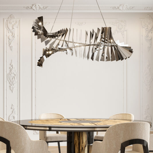 A contemporary dining room features an elegant, round wooden table surrounded by four beige upholstered chairs. Above the table hangs the Statement Contemporary Polished Nickel Chandelier with a swirling design of wing-like elements. The walls are adorned with ornate white moldings, enhancing the sophisticated ambiance.
