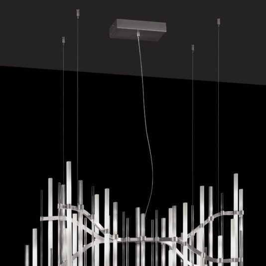 The Vertical Murano Glass Tube Chandelier boasts a modern rectangular metallic canopy that suspends several vertical Murano glass tubes at varying heights. Its sleek design features intricate metalwork and cylindrical lights, emanating an elegant and contemporary aesthetic, with a black background that emphasizes its form.