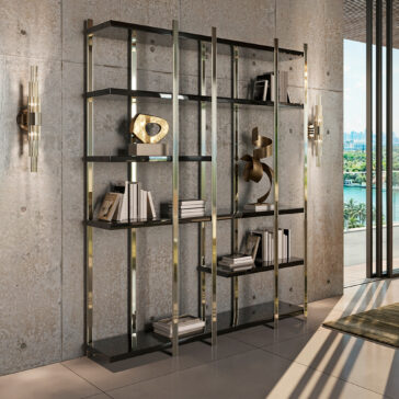 Large Modern Open Bookcase A modern living room has the Large Modern Open Bookcase with sleek metal and glass shelves against a textured concrete wall. Abstract sculptures and books adorn it, two decorative wall lights enhance the ambiance, and expansive windows frame a captivating cityscape with greenery beyond.