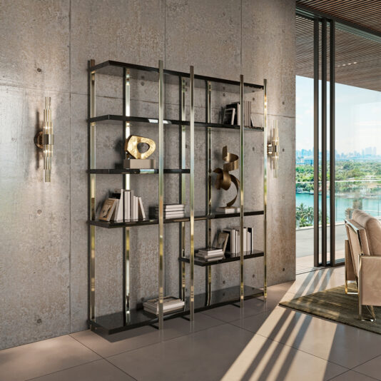Large Modern Open Bookcase In a modern living room, the Large Modern Open Bookcase made of metal and glass stands against a concrete wall. It elegantly displays art and books, while wall lights illuminate the area. Expansive windows offer stunning cityscape views with shimmering water beyond.