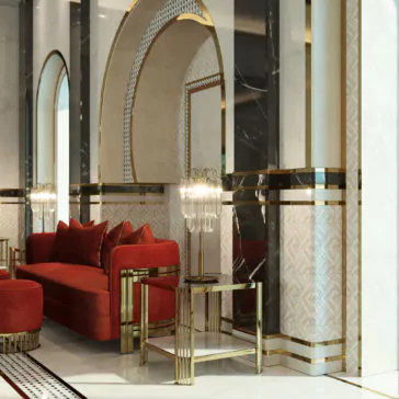 Art Deco Inspired Square Side Table Immerse yourself in an elegant interior adorned with luxurious gold and red accents. The centerpiece, a plush red sofa with matching pillows, is set against a backdrop of striking black and white marble walls. Our Art Deco Inspired Square Side Tables grace the room, each topped with modern glass lamps. Ornate arches enhance the space further, seamlessly blending traditional opulence with contemporary sophistication.