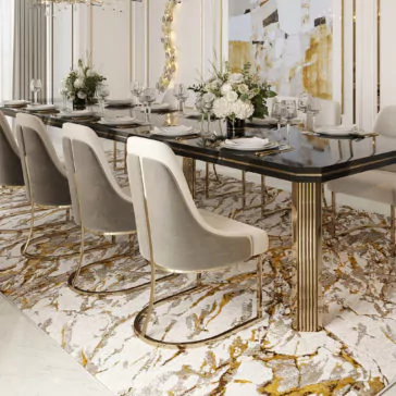 Contemporary Two-Tone Dining Chair A luxurious dining room showcases a long, black table adorned with gold accents, encircled by eight Contemporary Two-Tone Dining Chairs in beige and gold. The table is elegantly set with plates, glasses, and white floral centerpieces. Overhead, a modern chandelier illuminates the space while abstract artwork enhances the walls.