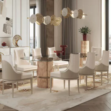 Modern Veneered Rectangular Glass Dining Table A modern dining room showcases a stylish Modern Veneered Rectangular Glass Dining Table with a striking marble base, surrounded by eight elegant white upholstered chairs. Above the table hangs a chic chandelier adorned with gold and white discs. The space is decorated with abstract art, greenery, and large windows, creating an ideal environment for any veneer-loving enthusiast.