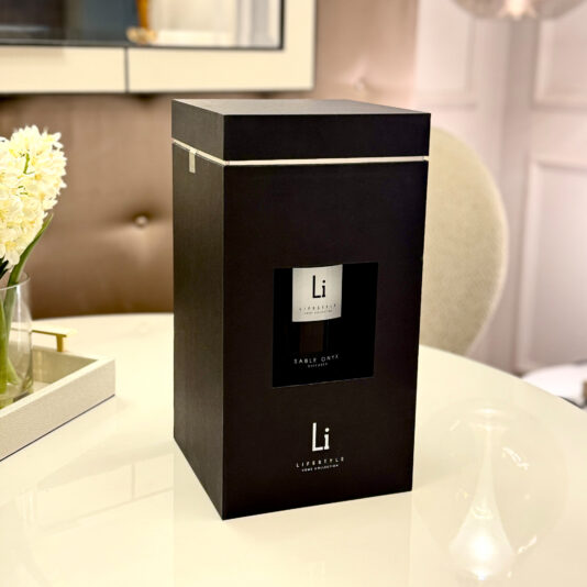 A sleek black box adorned with the logo and name 