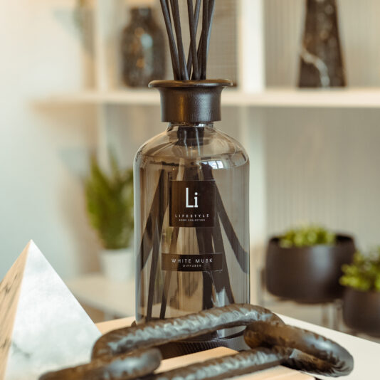 A dark glass bottle labeled 