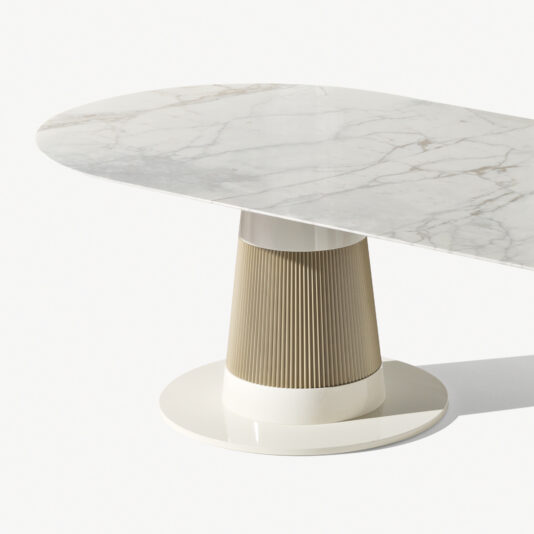 High End Contemporary Marble Oval Dining Table The High End Contemporary Marble Oval Dining Table boasts a sleek white and grey veined marble top, elegantly supported by a distinctive base with a tapered, textured beige cylindrical center and a glossy white circular foundation, exemplifying modern minimalist design.