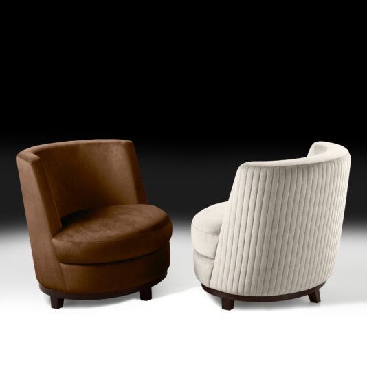 Two modern round swivel chairs are displayed against a gradient white-to-black background. The chair on the left is upholstered in brown velvet, while the Quilted Occasional Chair With Swivel Base on the right is covered in white fabric with a vertical ribbed pattern on the back. Both chairs have dark wooden bases.