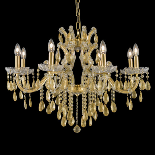 The Gold Leaf Glass Chandelier, adorned with eight candle-like light bulbs and elaborate crystal decorations, gracefully hangs against a black background. Featuring intricate scrollwork and a stunning array of teardrop-shaped crystal pendants, this luxurious piece exudes elegance.