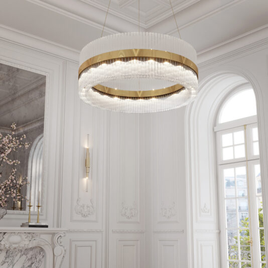 Large Modern Round Chandelier A Large Modern Round Chandelier hangs impressively from the ceiling of an elegant room adorned with ornate white walls and expansive arched windows. The chandelier boasts a circular design embellished with crystal accents. In the background, you can see a nearby wall sconce and a decorated mantle featuring a vase.