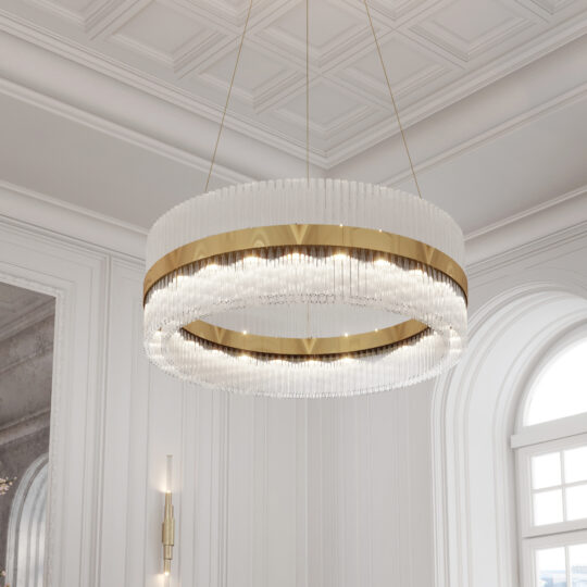 A Large Modern Round Chandelier adorned with luxurious crystal elements hangs from the ceiling in an elegantly designed room featuring white walls, expansive arches, and detailed molding. The chandelier is accentuated with gold tones and emits a bright, sophisticated light.