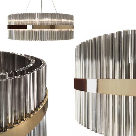 Large Modern Round Chandelier The Large Modern Round Chandelier features multiple vertically aligned metallic tubes with a sleek, polished finish. It is suspended by wires and showcases detailed texture and reflective quality in both the metal tubes and the metallic ring.