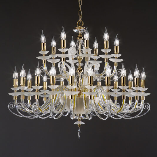 The Large Satin Glass Chandelier boasts an opulent design, featuring multiple tiers of gracefully curved metal arms adorned with numerous candle-like light bulbs and intricate satin glass detailing. This grand fixture includes elegant gold accents and is set against a dark background.