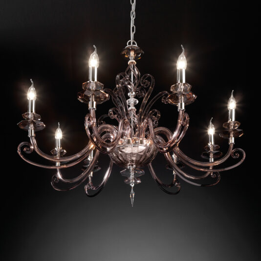 The Smoked Glass 8 Arm Chandelier, with its seven illuminated bulbs and sophisticated design featuring curved glass arms and intricate details, hangs elegantly against a dark background, casting a warm, inviting glow.