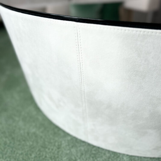 Contemporary Glass Round Coffee Table close up of a leather drum luxury coffee table