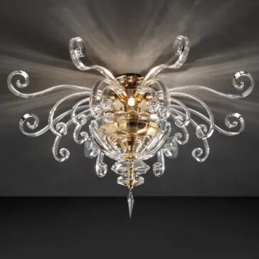 Contemporary Glass Swirl Ceiling Light The Contemporary Glass Swirl Ceiling Light features an ornate crystal chandelier design with a gold base and multiple curved, transparent arms radiating outward. Each arm ends in a delicate curl, and a faceted crystal drop hanging from the center casts intricate light patterns on the ceiling.