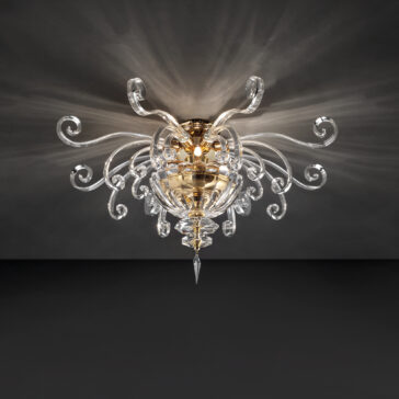 Contemporary Glass Swirl Ceiling Light The Contemporary Glass Swirl Ceiling Light exudes luxury with its intricate, ornate design. This chandelier features a central golden sphere surrounded by multiple swirling, transparent glass arms that extend outward, each ending in crystal-like decorative elements. It casts elegant patterns across the dark ceiling.